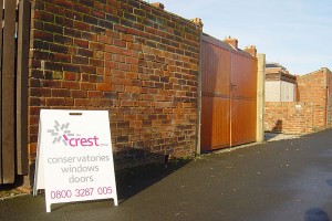 A board sign outside a building entrance