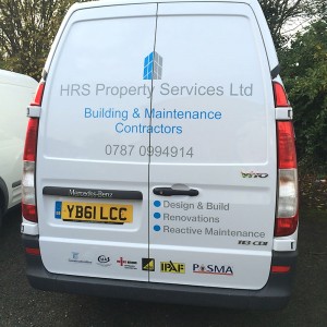 van with branded vehicle graphics on the back