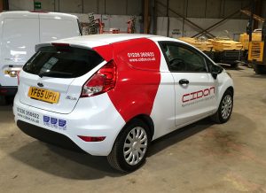 Photo of a car with vehicle graphics that S&S Signs & Graphics applied