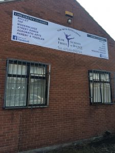 An example of a lightweight and flexible PVC banner attached to a building